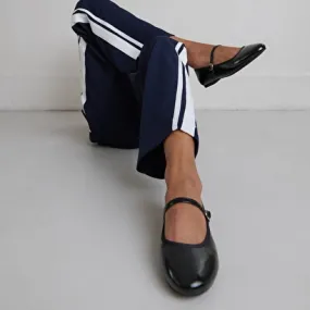 Ballet flats with straps in black pleated patent