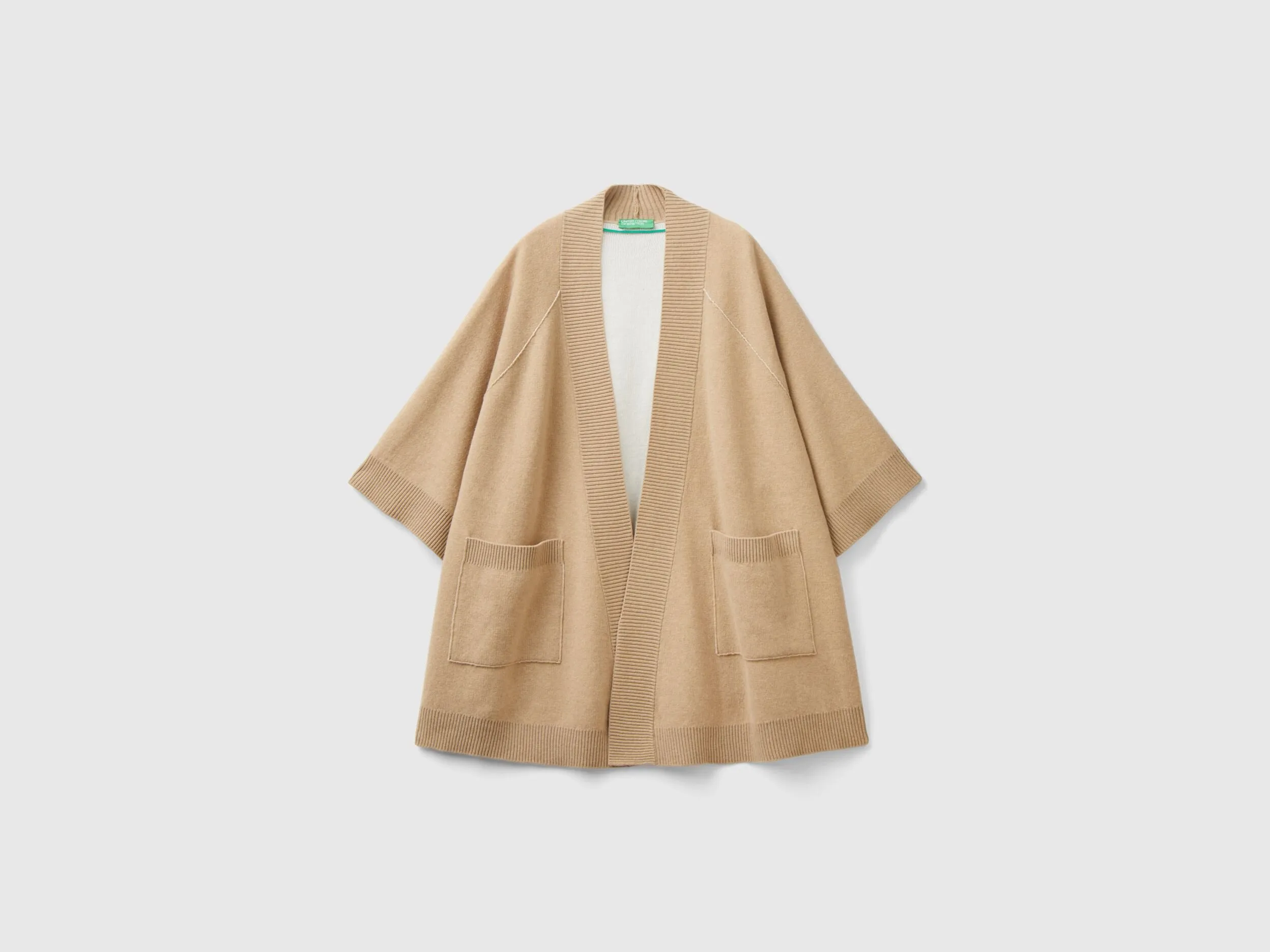 Open knitted cape - Beige | Benetton